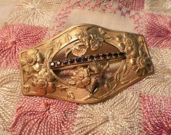 Art Nouveau Brass Brooch: Repousse Floral Design with Purple Stones