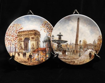 Louis Dali Pair Of Limited Edition Limoges Porcelain Decorative Plates: "L'arc De Triomphe & La Place De La Concorde, Made In France