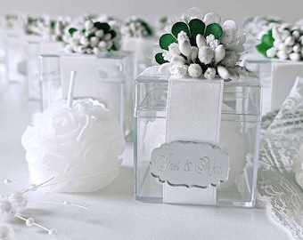 Vela perfumada de rosa para recuerdo de boda: caja de plexiglás de lujo con vegetación y etiqueta con espejo