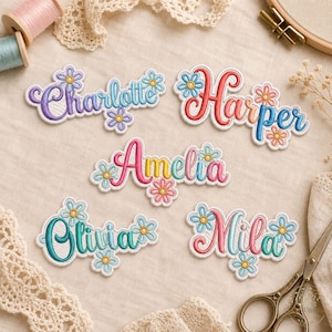 May include: Five embroidered name patches featuring the names Charlotte, Harper, Amelia, Olivia, and Mila. Each name is stitched in a colorful script font and decorated with small, light blue and yellow flower accents around the letters.