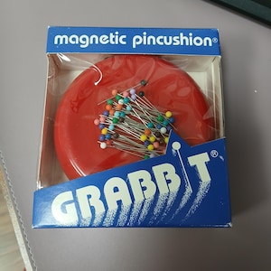 1980s Red Magnetic pincushion with pins