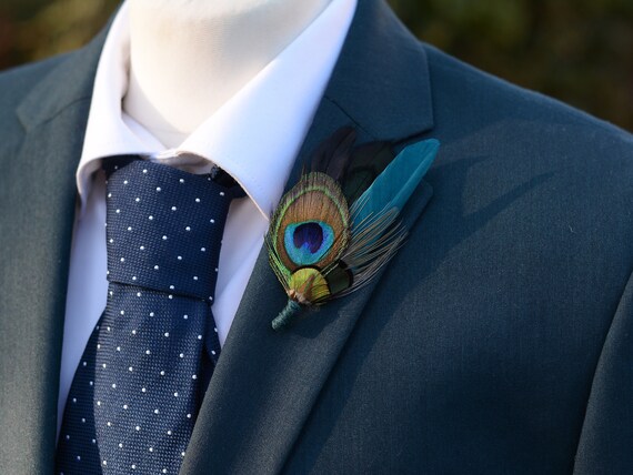 Feather brooch deals for suit