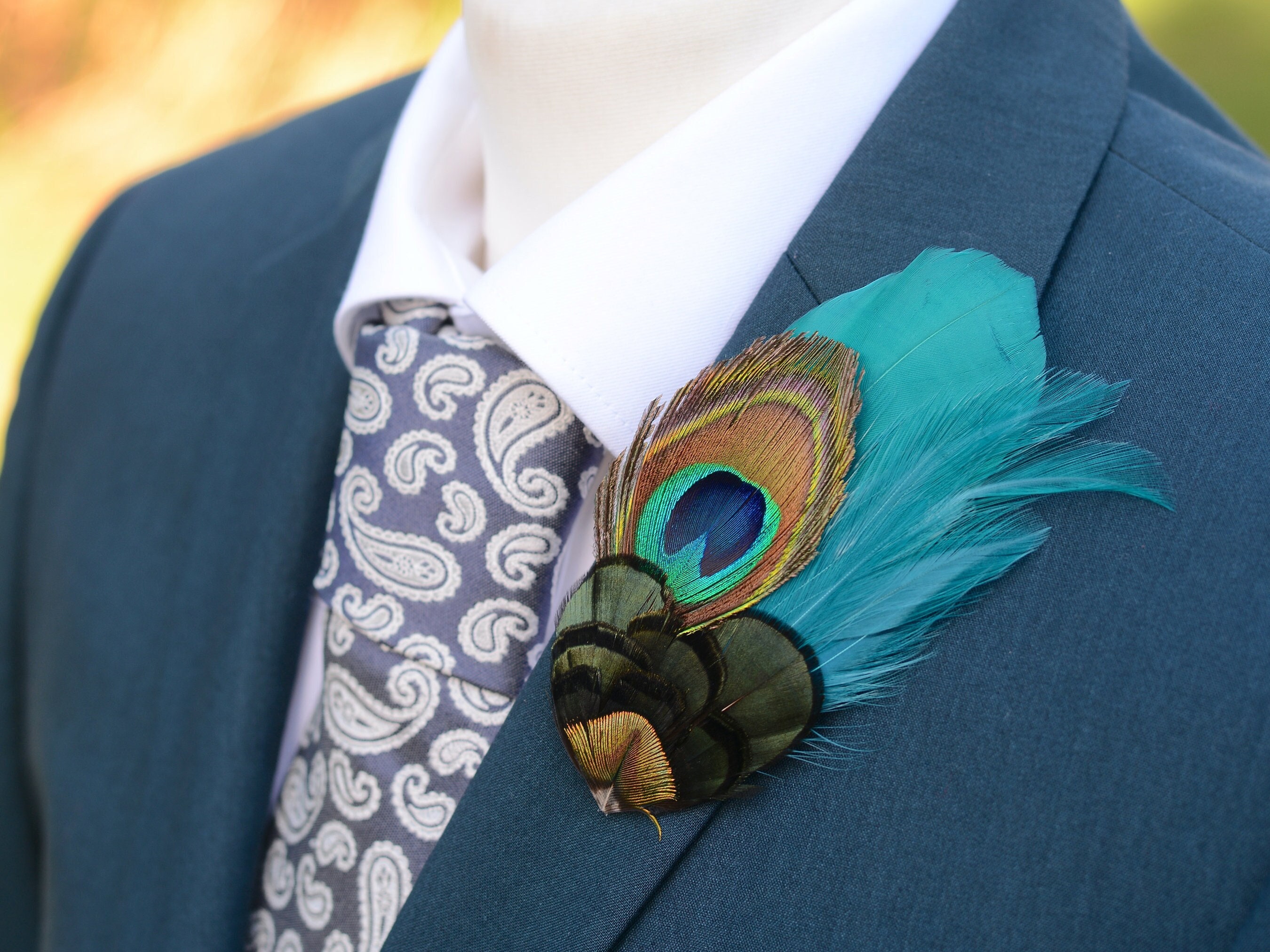Feather brooch for suit best sale