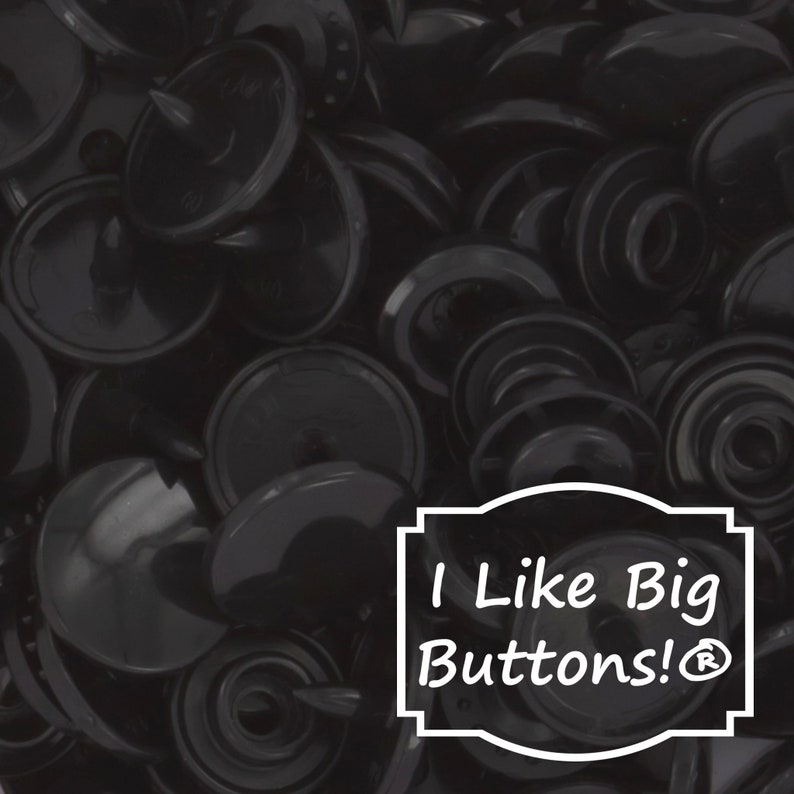 May include: A close-up image of a large pile of black plastic buttons. The buttons are round and have a raised center. The text "I Like Big Buttons!&reg;" is visible in the lower right corner of the image.
