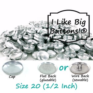 May include: A collection of silver-colored metal buttons with a cap, flat back, and wire back options. The text "I Like Big Buttons!" is displayed above the buttons. The size is 20, which is 1/2 inch.