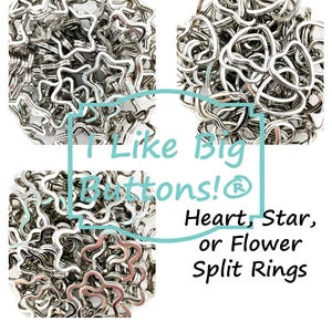 May include: A collection of silver-colored split rings in heart, star, and flower shapes. The image includes the text "I Like Big Buttons!" and "Heart, Star, or Flower Split Rings".