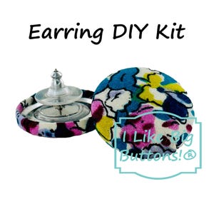 May include: DIY earring kit featuring a pair of colorful fabric covered buttons with a floral pattern. The buttons are attached to earring posts with silver backs. The kit includes the text "I Like Big Buttons!"