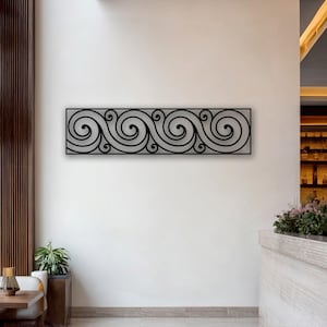 May include: A rectangular wall art piece featuring a black metal frame with a continuous, repeating scroll pattern. The design consists of interconnected, swirling lines that create a series of wave-like shapes across the entire horizontal surface.