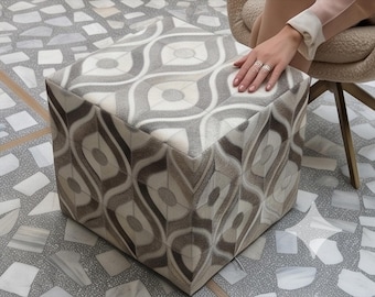 Puf otomano geométrico de piel de vaca, reposapiés de cuero con patchwork en forma de S, puf cuadrado con arabesco ondulado, asiento cúbico moderno de estilo bohemio para interiores.