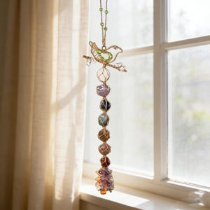 May include: A white ceramic mug with a black handle and the text "But First, Coffee" in a black, bold font. The mug is sitting on a wooden surface.