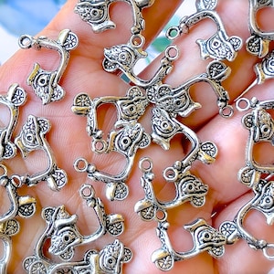 VINTAGE: 24pcs Metal Scooter Pendants - Jewelry Making