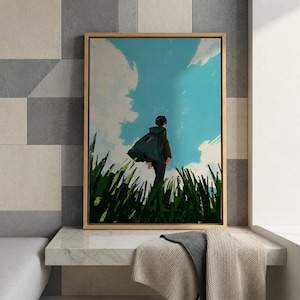 May include: A framed art print depicts a person standing in a field of tall green grass, looking towards a bright blue sky with white clouds. The person wears a green cloak. The artwork has a painterly style.