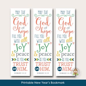 May include: Three printable bookmarks with a white background and colorful text. The text reads "May the God of hope fill you with all joy and peace as you trust in Him. Romans 15:13".