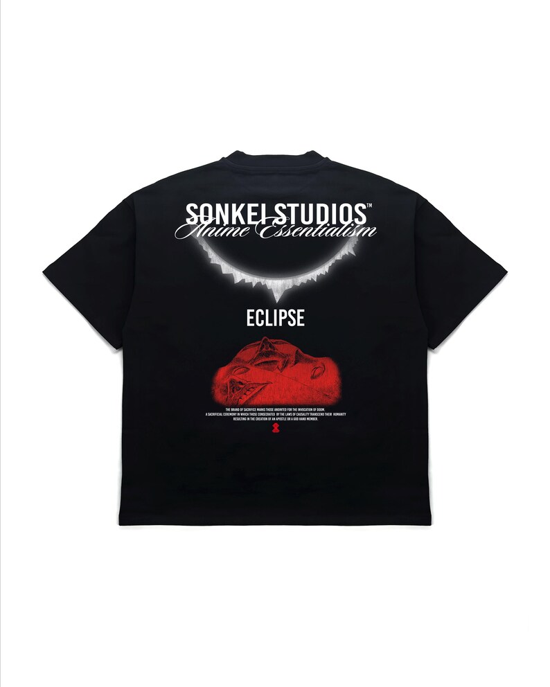 May include: Black t-shirt with the text "SONKEI STUDIOS Anime Essentialism" above the word "ECLIPSE". A red graphic is below the word "ECLIPSE". The shirt has short sleeves and a crew neck.