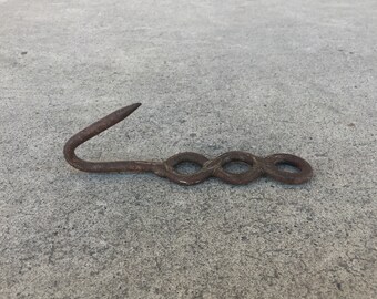 Loop De Loop De Loop -- One antique steel meat hook of French origins