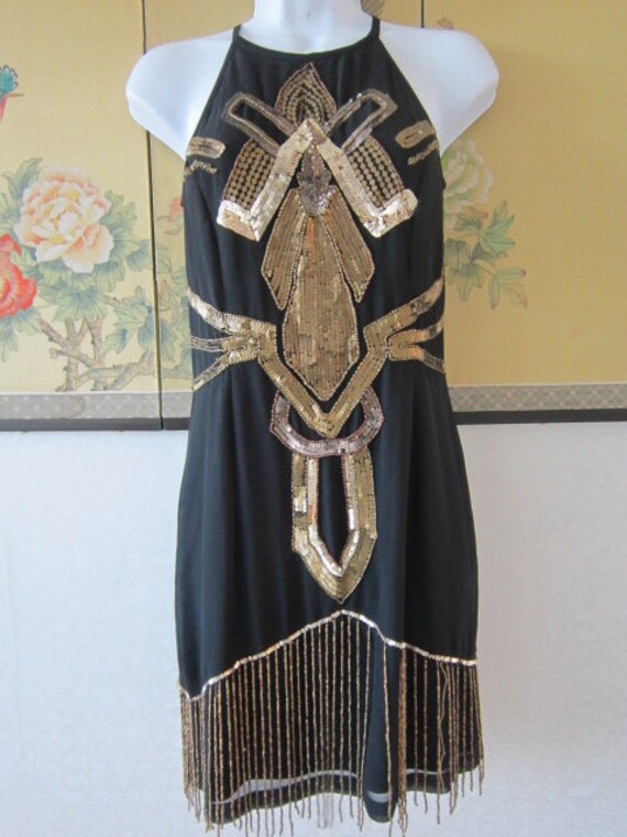 black dress with gold design