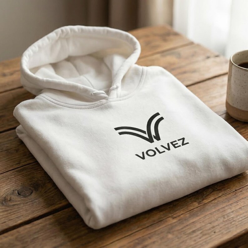 May include: A set of three ceramic mugs with a speckled, matte finish. The mugs are in shades of cream, light gray, and dark gray. Each mug has a simple, minimalist design and a rounded handle.