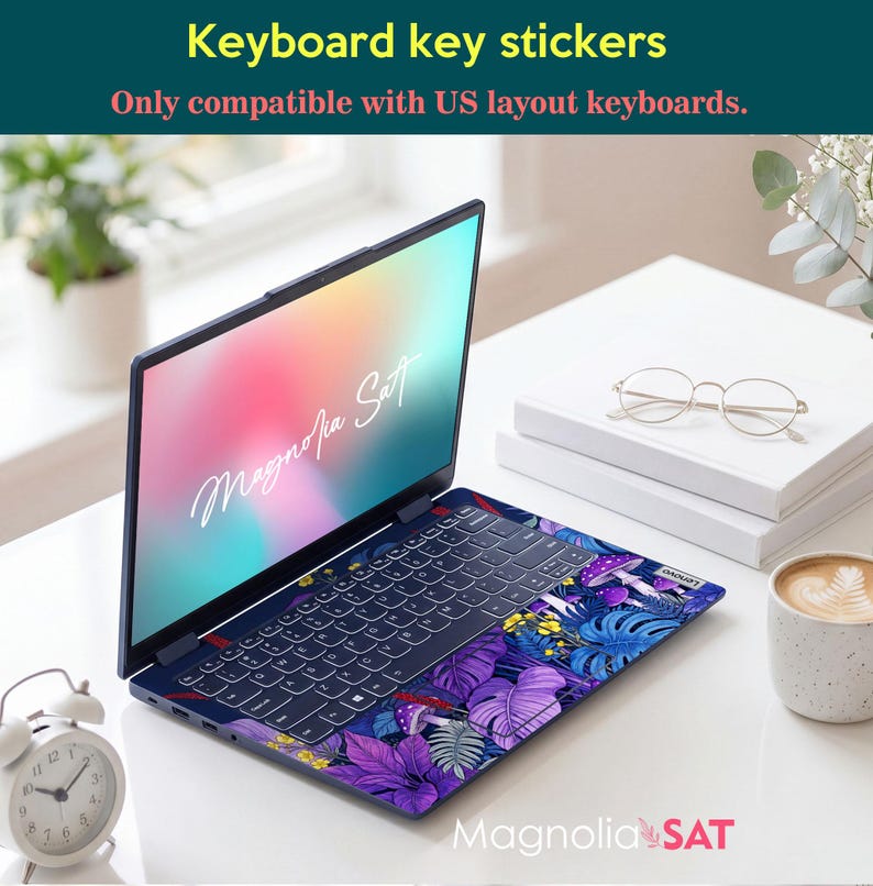 May include: A laptop featuring keyboard key stickers with a vibrant purple and blue botanical pattern of mushrooms and tropical leaves. The screen displays the text Magnolia Sat. The top text reads Keyboard key stickers. Only compatible with US layout keyboards.