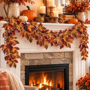 May include: An autumn-themed fireplace mantel garland featuring vibrant maple leaves in shades of red, orange, and yellow, accented with dark berries. The garland is draped across a white mantel decorated with pumpkins, candles, and foliage.