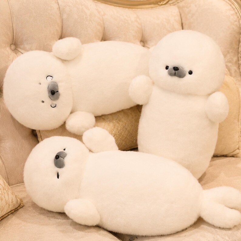 Kawaii sleeping seal plush with soft white plush fabric and PP cotton filling, cute seal pillow for kids and adults, large 70cm size perfect for cuddling and home decor, calming plush toy for bedrooms, sofas, and living room styling, adorable animal plushie for a cozy touch in any room, comforting seal stuffed animal for relaxation and stress relief, perfect gift for children and seal lovers, cute addition to any home decor collection
