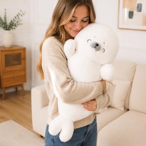 Kawaii sleeping seal plush with soft white plush fabric and PP cotton filling, cute seal pillow for kids and adults, large 70cm size perfect for cuddling and home decor, calming plush toy for bedrooms, sofas, and living room styling, adorable animal plushie for a cozy touch in any room, comforting seal stuffed animal for relaxation and stress relief, perfect gift for children and seal lovers, cute addition to any home decor collection