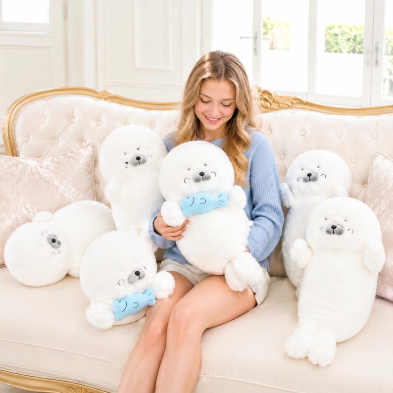 Kawaii sleeping seal plush with soft white plush fabric and PP cotton filling, cute seal pillow for kids and adults, large 70cm size perfect for cuddling and home decor, calming plush toy for bedrooms, sofas, and living room styling, adorable animal plushie for a cozy touch in any room, comforting seal stuffed animal for relaxation and stress relief, perfect gift for children and seal lovers, cute addition to any home decor collection