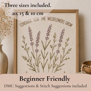 May include: A framed embroidery piece on light fabric featuring lavender sprigs and the text "CONSIDER HOW THE WILDFLOWERS GROW". The design includes three sizes of 20, 15 & 10 cm. The embroidery uses purple and green thread on a neutral background.