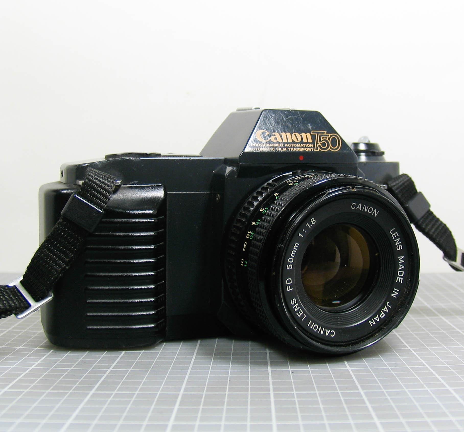 Canon T50 35mm SLR Film Camera With an FD 50mm F/1.8 Prime Lens