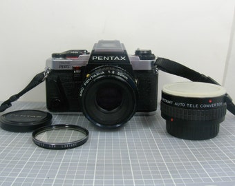 Pentax Program Plus 35mm SLR Film Camera with an SMC Pentax-A 50mm f/2 Prime Lens and a 2X Teleconverter