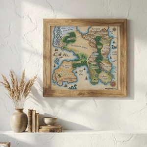 May include: A framed fantasy map of Erilea featuring labelled regions like The Western Wastes, Terrasen, Adarlan, and Eylwe. The map includes illustrations of mountains, forests, ships, and sea creatures, all rendered in a parchment-style aesthetic.