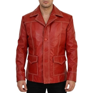 May include: A bright red leather jacket featuring a wide collar, long sleeves, and a front button closure. The jacket is accented with prominent white contrast stitching along the seams, pockets, and cuffs, and includes two front flap pockets.