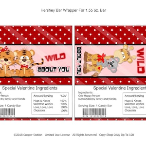 May include: A printable Hershey's chocolate bar wrapper with a red and white polka dot background. The wrapper features a pink panel with a cartoon tiger couple and the text "WILD ABOUT YOU". The wrapper also includes a list of "Special Valentine Ingredients" with a serving size of 1 candy bar.