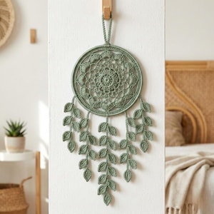 Virkat väggbonadsmönster med lövranka, boho virkad mandala med naturblad, botanisk DIY-dekoration med heminredning