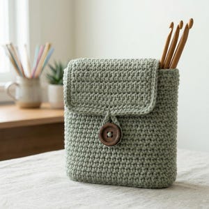 May include: A set of three ceramic mugs with a speckled, matte finish. The mugs are in shades of cream, light gray, and dark gray. Each mug has a simple, minimalist design, perfect for coffee or tea.