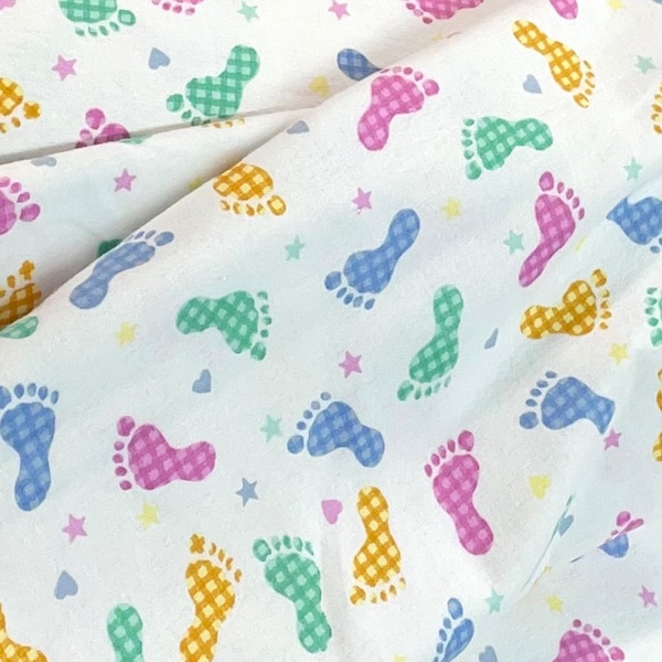 Baby footprint fabric, plaid pink blue green yellow red, bright colors, pastel colors, newborn baby feet, infant foot print flannel blanket