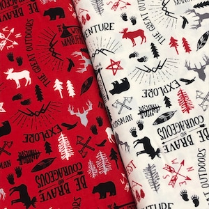 May include: Red and white fabric with a repeating pattern of woodland animals, trees, and text. The text includes "Be Brave and Courageous", "The Great Outdoors", "Explore", and "Woodman".