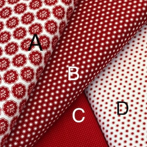 Könnte beinhalten: Vier verschiedene Stoffe in Rot und Weiß mit Mustern, die mit A, B, C und D gekennzeichnet sind. Die Stoffe sind gefaltet und übereinander gelegt.