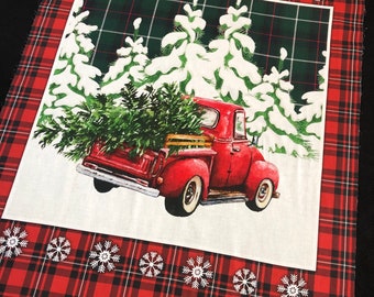Blank Quilting Giddy Up Santa Red Truck On Plaid fabric last piece 32 inches
