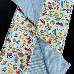 Toy rag quilt, Rocking horse 3 warm flannel layers, approx 33x38, blue green yellow, fire trucks, duck, baby boy, ball, blocks, airplane