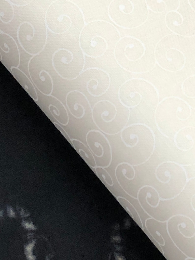 May include: A white fabric with a repeating pattern of white swirls on a white background.