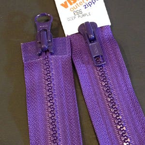 May include: A 28 inch purple zipper with a YKK Vislon outerwear zipper pull. The zipper is labeled "#66 Deep Purple".