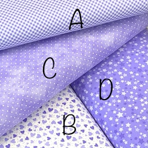 May include: Four different fabric swatches in shades of purple. The top swatch has a white and purple gingham pattern. The second swatch has a white background with small purple dots. The third swatch has a white background with small purple hearts. The fourth swatch has a purple background with small white stars.