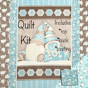 May include: Quilt kit featuring two gnomes in a winter scene with snowflakes. The kit includes the top, back, and binding.