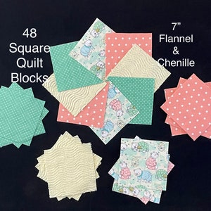 Peut inclure: 48 blocs de courtepointe carrés de 7 pouces faits de tissu en flanelle et en chenille. Les blocs présentent une variété de motifs, notamment des pois, des lignes ondulées et un motif avec des ours portant des pyjamas.