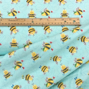 honey bee flannel fabric, bee hive flannel, aqua blue yellow, yellow plaid, buzzing bees, honey pot, baby beehive bumble bee, baby blanket