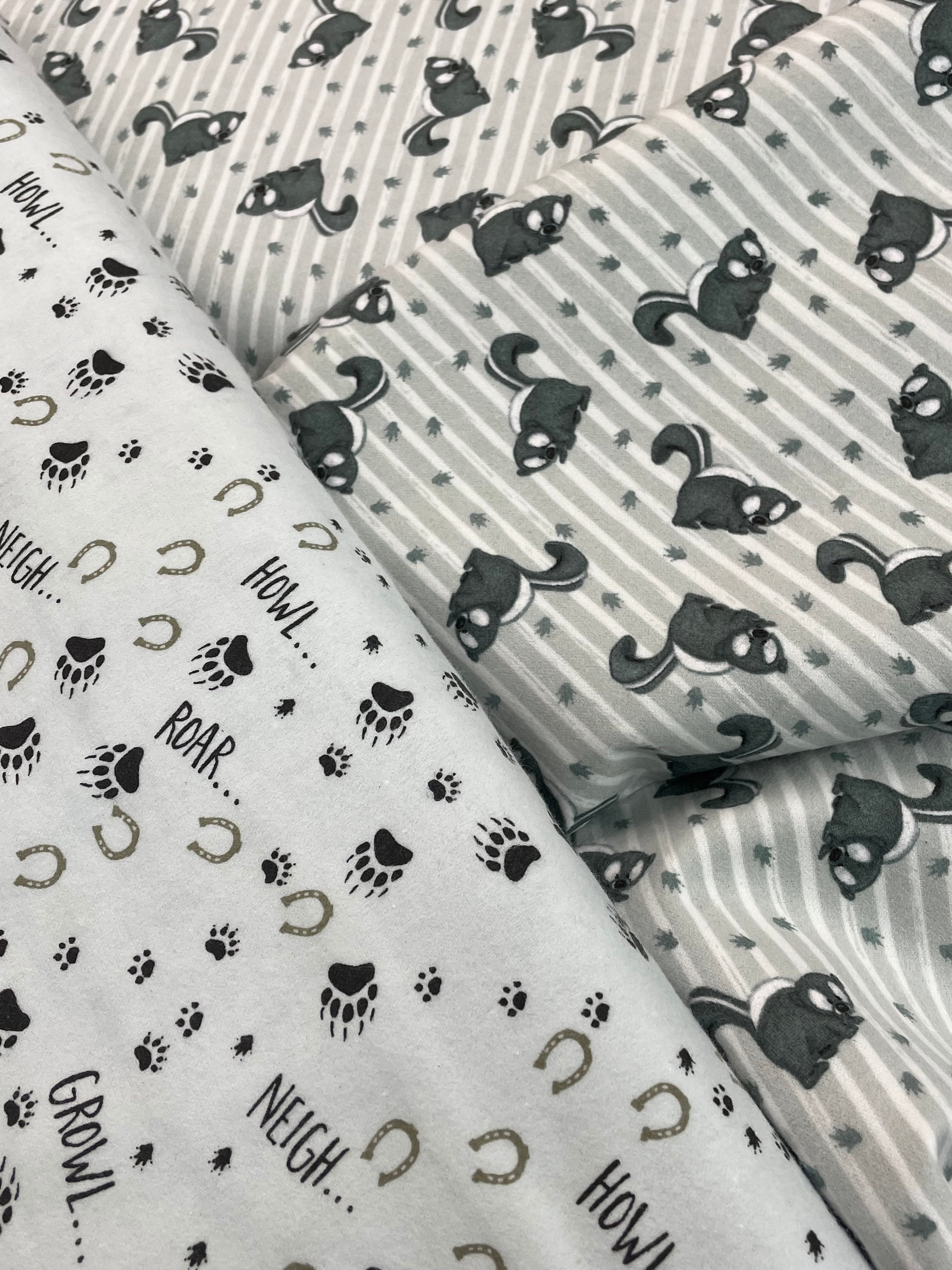Furr ever friends woodland animal flannel, bear wolf horse skunk lion, gray black cream, claws paw prints fabric, by Henry Glass, baby quilt