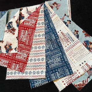 Americana John Wayne 8- 1/4 yd cut bundle, stars quotes, red blue cream Freedom courage, USA flag The Duke Western hero, sheriff