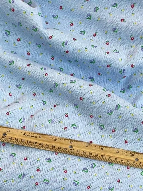 stretch knit, pink blue white with cute flowers, cute girl fabric, perfect for pajamas, or a cute little girl dress, made by Tonka Textiles