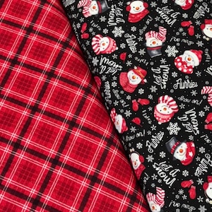 May include: Two fabric patterns: a red and black plaid and a black fabric with snowmen, snowflakes, and the text "Let it snow!" and "Furries". The snowmen wear red hats and scarves.