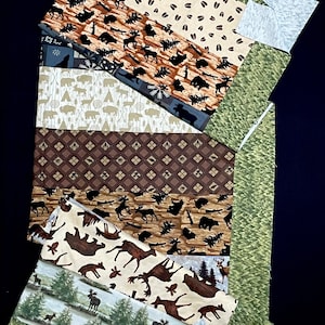 Woodland Deer Quilt Top, flannel Handmade Lap Quilt, patchwork quilt, green brown, deer bear moose silhouette, pinecone, unfinished quilt